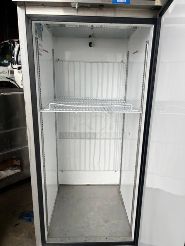 Beverage-Air stainless steel single door reach-in freezer, Model KF24-1AS, on casters, with poly coated wire rack, 1 phase.