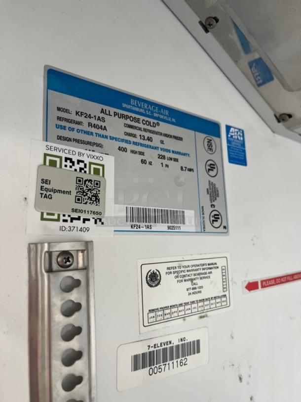 Beverage-Air commercial stainless steel single door reach-in freezer, model KF24-1AS, with poly-coated wired rack and caster wheels.