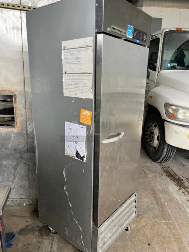 Beverage-Air KF24-1AS commercial stainless steel single door reach-in freezer, on casters, with poly-coated wired rack.