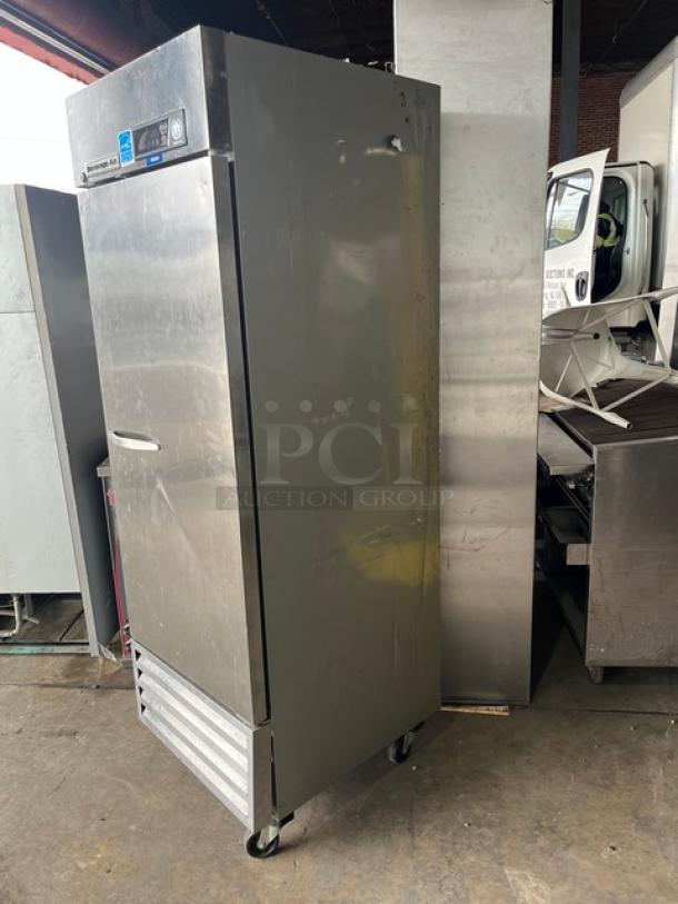 Beverage-Air stainless steel reach-in freezer, model KF241AS, with poly-coated rack, 1-phase, on casters, visible scuffs.