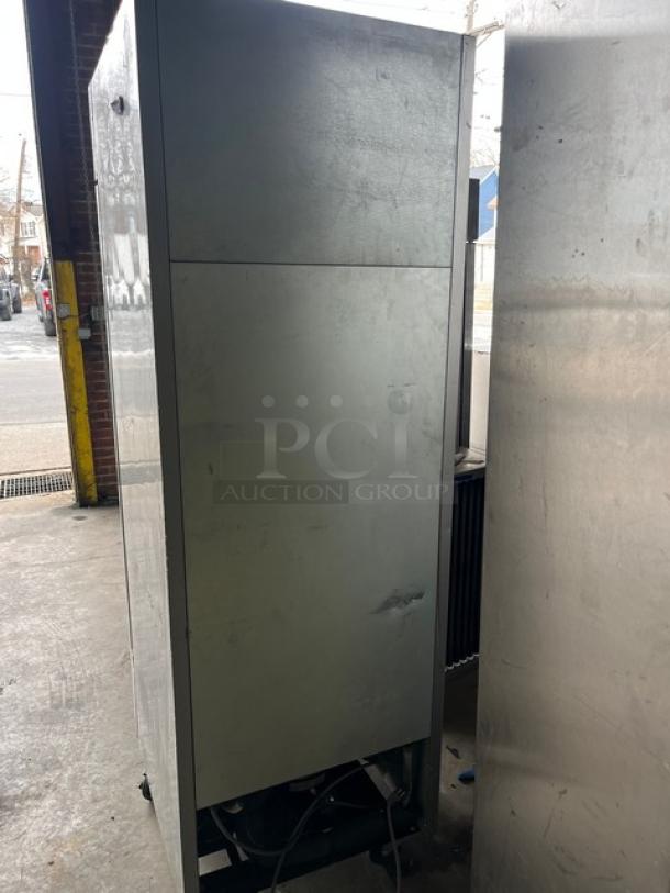 Beverage-Air stainless steel single door reach-in freezer, Model KF24-1AS. Includes poly coated wire rack, on casters.