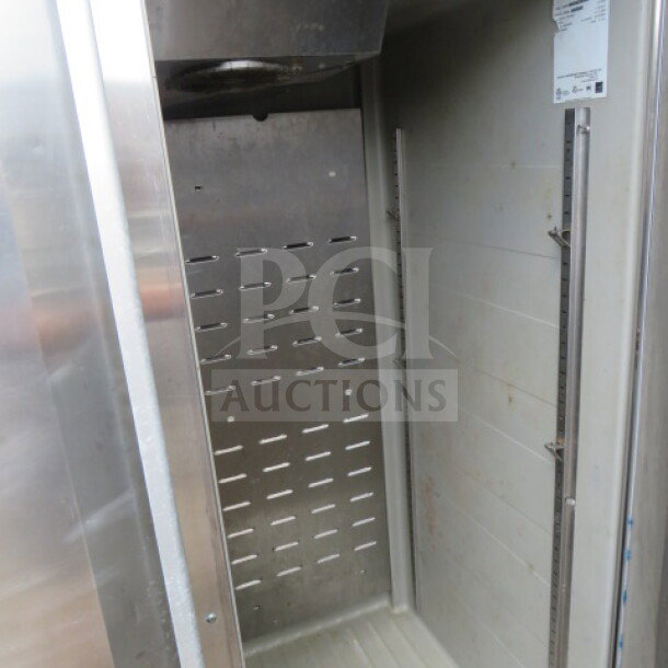 Two-door Hoshizaki stainless steel freezer, Model CF2B-FS, 115V, 55x33.5x79, excellent condition, internal view.