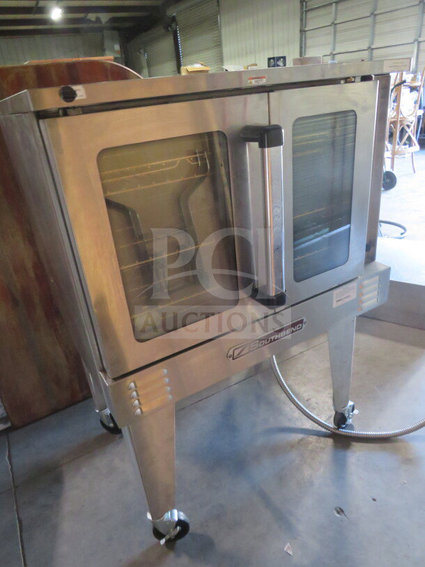 Southbend Platinum Series Electric Convection Oven, Model PCE75S/SD, with 5 racks on casters. Size 38x37x55. Working condition.