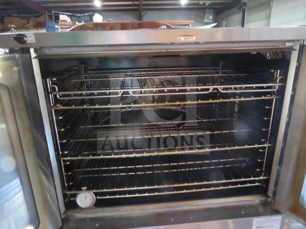 Southbend Platinum Series electric convection oven, model PCE75S/SD, with 5 racks, on casters. Dimensions: 38x37x55 inches.