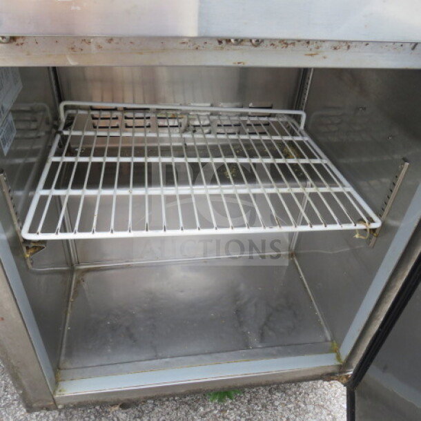 Avantco 1 Door Worktop Freezer, Model 178TUC27F, with 1 rack and casters, 115V, 27x29.5x36 inches, used condition.