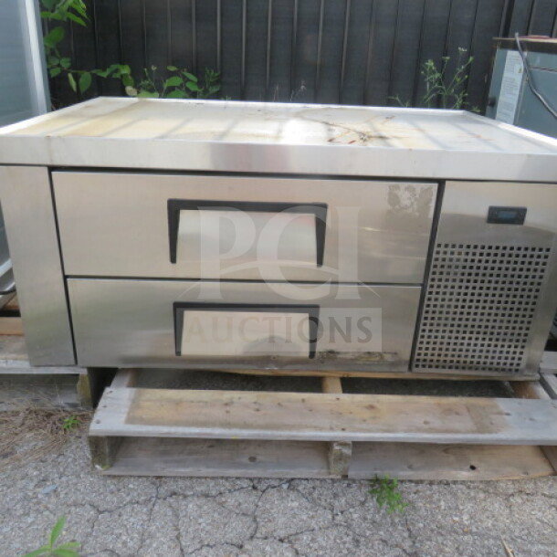 True TRCB-48 refrigerated chef base with two drawers on casters. Stainless steel, 115V, dimensions 48x32x36 inches.