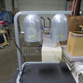 Winco food warmer, model EHL-2C, dual bulb, 120V. Silver finish, good condition, visible safety labels.
