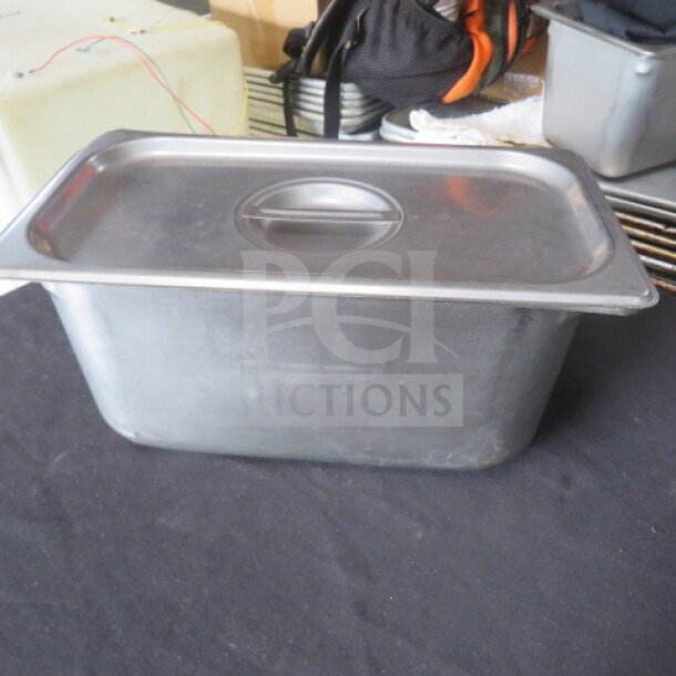1/3 size 6-inch deep hotel pan with lid, stainless steel, used condition, suitable for food service, model 2XBID.