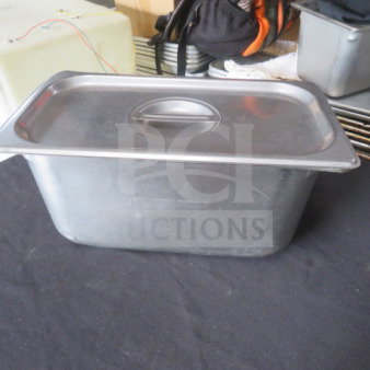 1/3 size 6-inch deep hotel pan with lid, stainless steel, used condition, suitable for food service, model 2XBID.
