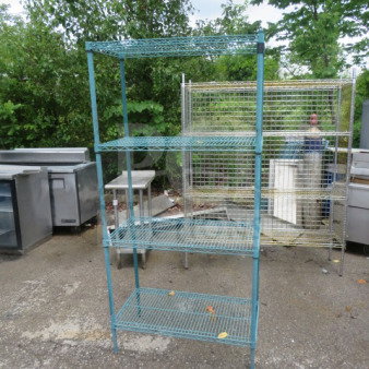 One green Metro shelf with four wire shelves, 36x18x75 inches. Suitable for storage, outdoor setting shown.