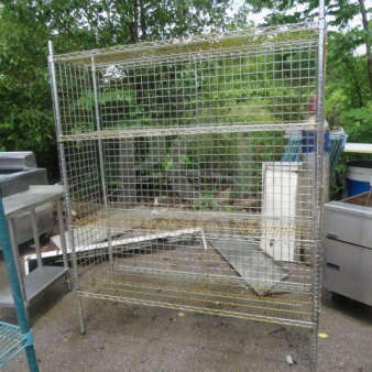 Metro shelf unit with 4 wire shelves, 60x18x75 inches. Sturdy metal construction, suitable for storage. Good condition.
