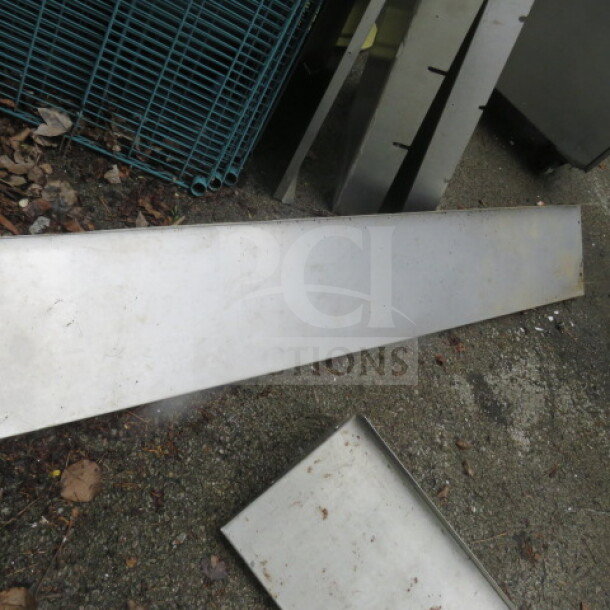 Stainless steel wall mount shelf, 72x12x12 inches, in used condition, showing slight wear. Ideal for storage solutions.