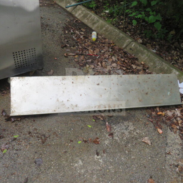 Stainless steel wall mount shelf, dimensions 60x12x12 inches. Some dirt present, indicating outdoor storage.