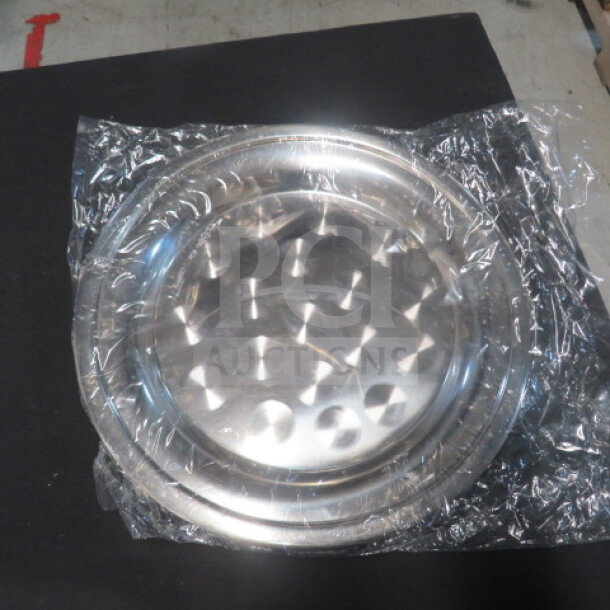 NEW 12-inch stainless steel cater tray, wrapped in plastic. Features a glossy finish, ideal for event serving.