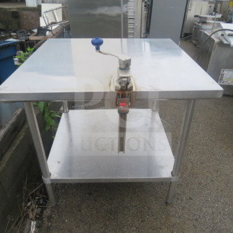 Stainless steel table with undershelf and Edlund 10lb can opener, 36x36x34 inches, used condition.