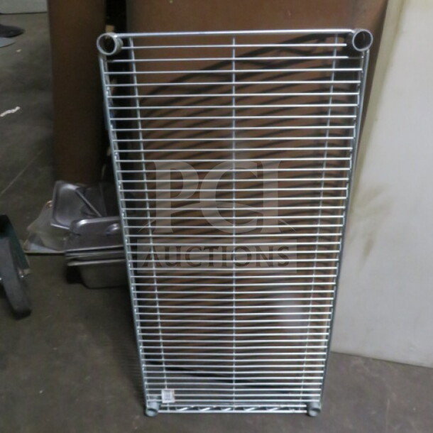 New 36x18 Nexel wire shelf, durable construction, priced at $82.75 each. Ideal for storage or organization.