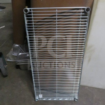 New 36x18 Nexel wire shelf, durable construction, priced at $82.75 each. Ideal for storage or organization.
