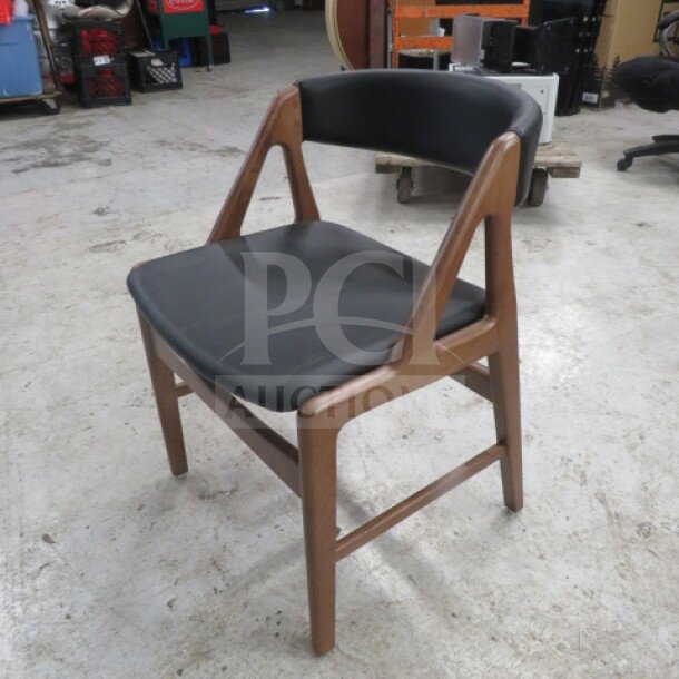 Meyer Design Form wooden barrel back chair with black cushioned seat and back, excellent condition.