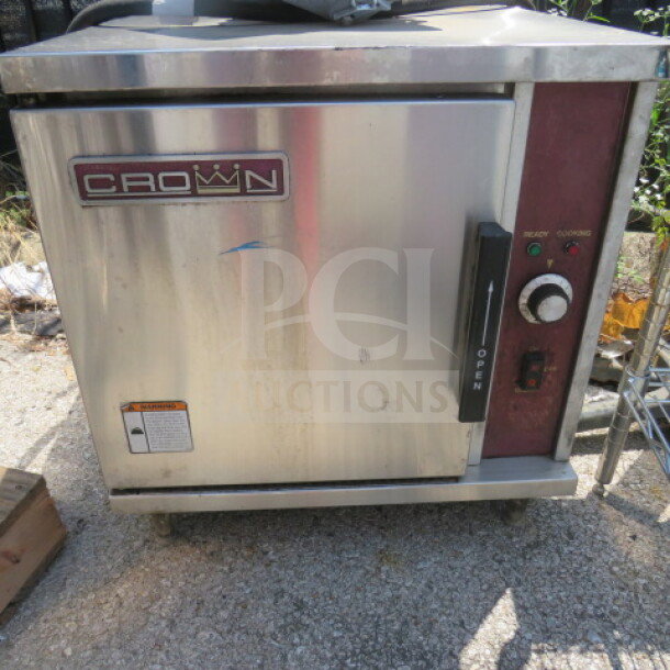 Crown SX5 electric convection steamer, 24x29x26 inches, stainless steel, good condition, visible control panel and brand label.