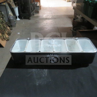 Malibu Domed Bar Center with five compartments, black exterior, logo on front, used condition. Ideal for bar organization.