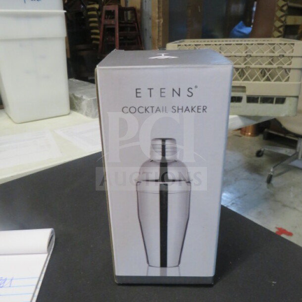 Stainless steel cocktail shaker in box; brand "ETENS." New condition.