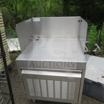 Glastender stainless steel under bar cabinet, Model PCB-24, with one door. Dimensions: 24"x25"x36". Used condition.