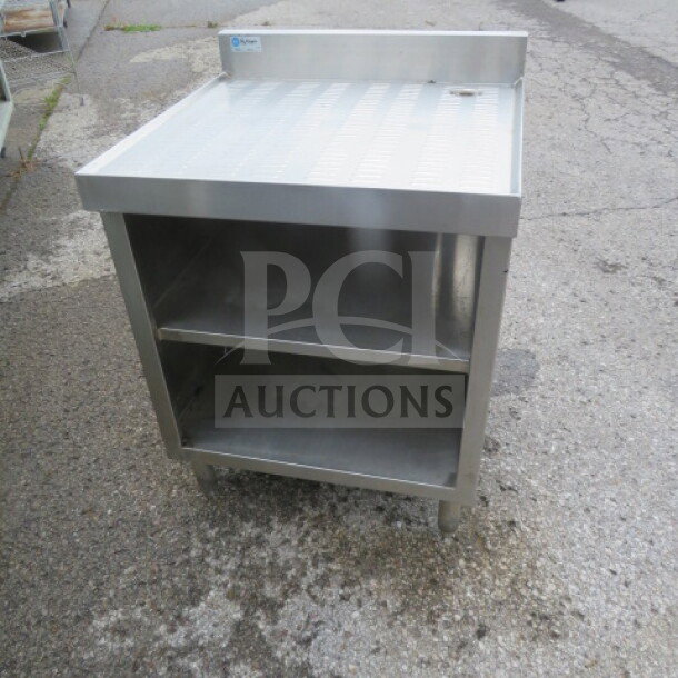 Klingers stainless steel drain table, Model GC-2S-24, 24x24x33 inches, with two under shelves, excellent condition.