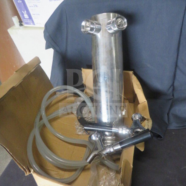New stainless steel keg tower with 2 taps, attached hoses, in original packaging. Ideal for draft systems.