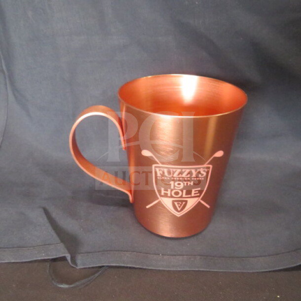 NEW Fuzzys Vodka Copper Mule Mug, logo "19th Hole," aluminum, mint condition, sleek design.