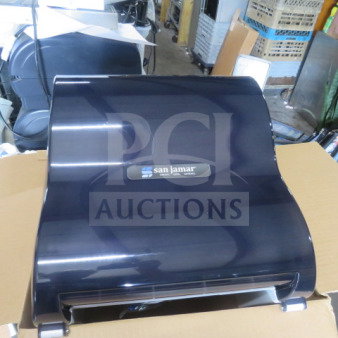 San Jamar T7100TBK wall mount paper towel dispenser, new condition, sleek black design, box included.
