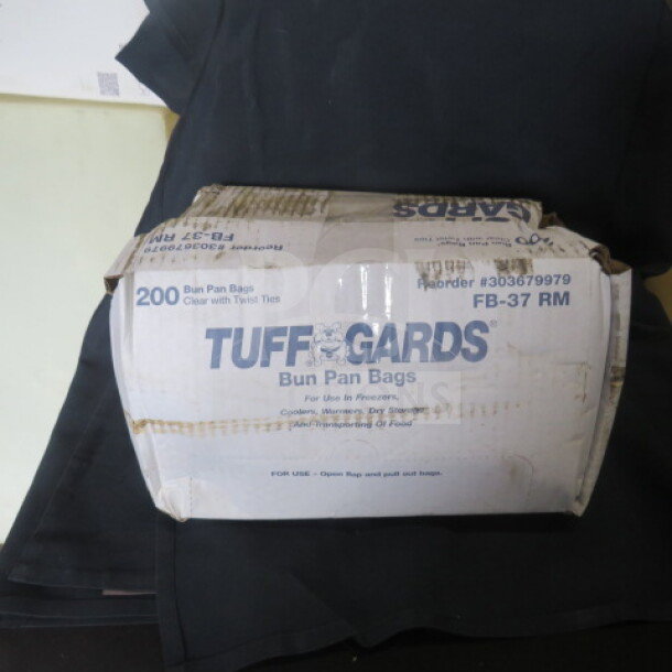 Box of 200 Tuff Gards Bun Pan Bags, model FB-37RM. Clear with twist ties. Slight wear on box corners.