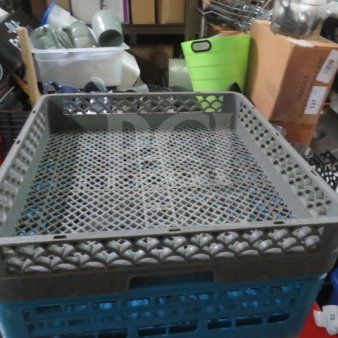 Gray plastic flatware dishwasher rack with lattice design and sturdy edges, suitable for industrial or home use.