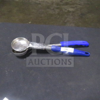2oz spoodle with metal bowl and blue handle, labeled with “2XBID,” in good condition, used for portion control.