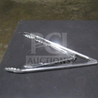 Assorted stainless steel tongs, shiny finish, scalloped edges, used condition, ideal for kitchen or grilling use.