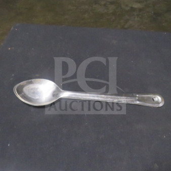 Stainless steel spoon, model 2XBID, in good condition. Simple design with a hole in the handle for hanging.