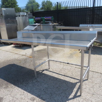 Stainless steel dishwasher table, one clean side, 90"x29"x37.5", sturdy frame, used condition, suitable for commercial kitchens.