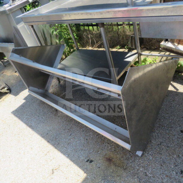 Stainless steel wall mount double shelf, 60x29x32, robust construction, used condition, ideal for kitchens or storage.