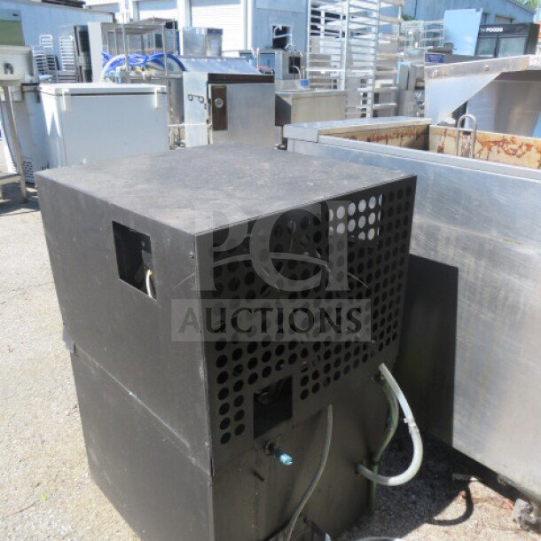 One Micro Matic Glycol Chiller, Model MMPP4302, 115V, 20x18x30 inches, shown in used condition.