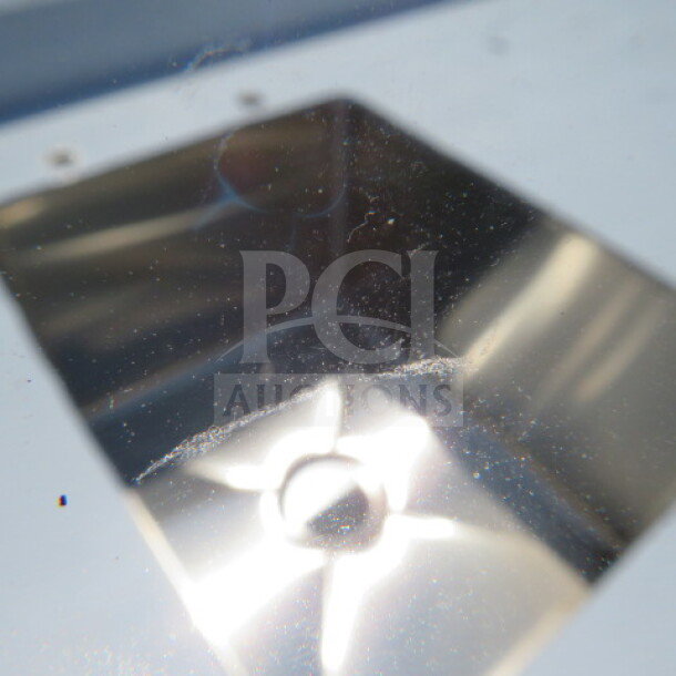 New stainless steel table with sink, backsplash, and undershelf. Dimensions: 60x30x41 inches. High-quality finish.