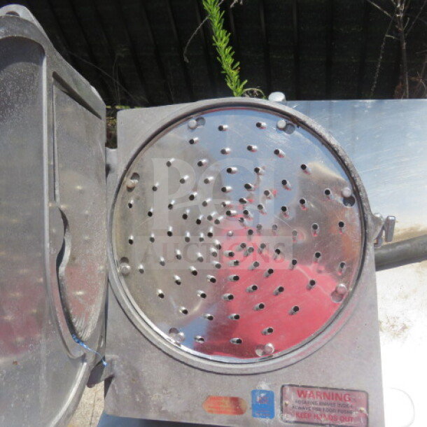 Steel Pelican head attachment with perforated disc and warning label visible. Condition: Used. Price: $699.99.