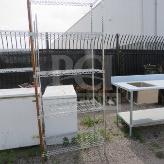 Metro shelving unit with 5 wire shelves, 36x24x87 inches. Used condition, no visible tags or markings. Ideal for storage.