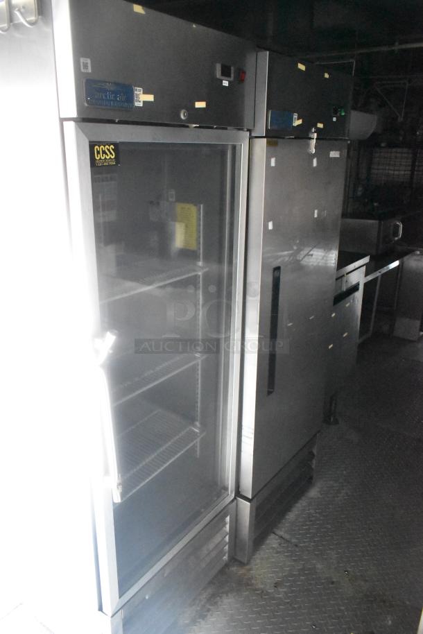 Cruising Kitchens 24' food trailer interior. Features commercial-grade Arctic Air equipment. Suitable for diverse menus. Clear title.