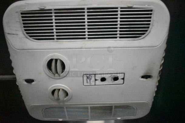 Ceiling-mounted ventilation unit in Cruising Kitchens 24' food trailer. Features adjustable vents and control panel.