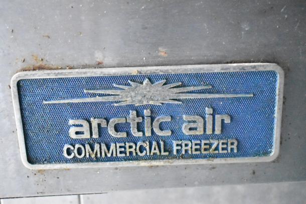 Arctic Air commercial freezer logo on a food trailer, indicating high-quality refrigeration equipment.