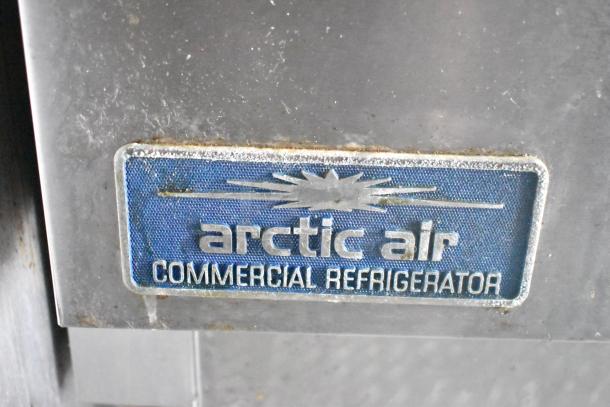 Arctic Air commercial refrigerator label, part of a Cruising Kitchens 24' food trailer, indicating equipment details.