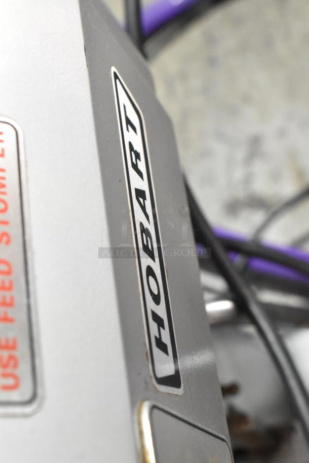 Hobart A120T metal commercial countertop 12-quart planetary dough mixer, visible Hobart branding.