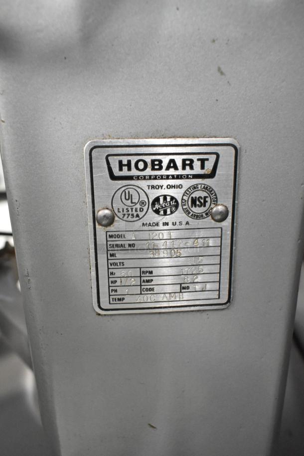 Hobart A120T metal commercial 12-quart dough mixer, 115 volts, 1 phase. Features model label with specs and UL, NSF certifications.