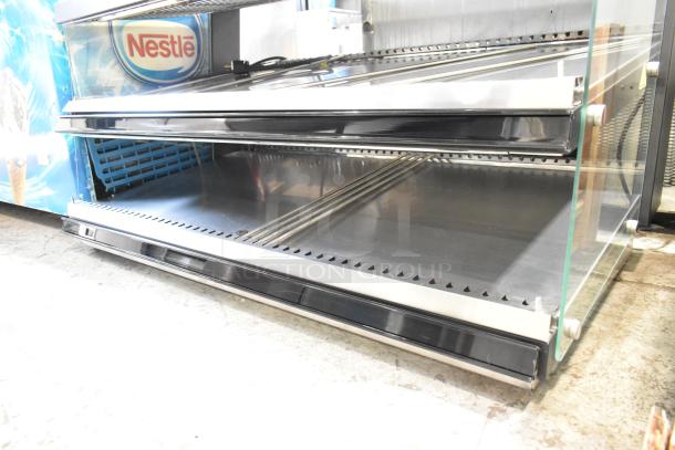 BRAND NEW ServIt OAM-138D 48" heated display merchandiser, slanted 2-shelf, stainless steel, 120V, 1 phase.