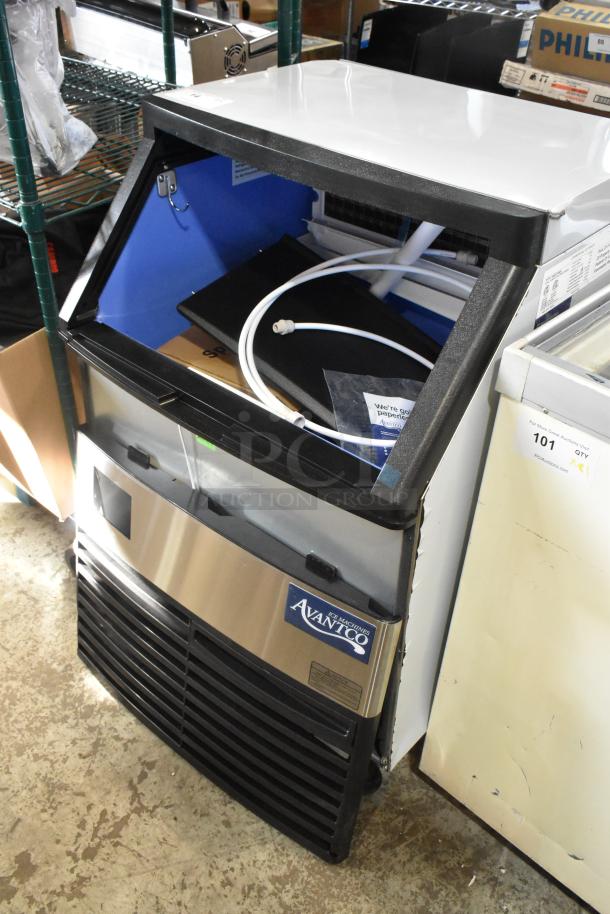 BRAND NEW Avantco 194UCF280A Stainless Steel Ice Machine, 299 lb, 115V, 1 Phase, visible dents, with tags and connections.