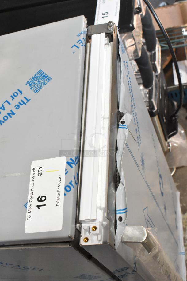 Brand new Manitowoc USE0050A-161 ice machine, stainless steel, 45 lb capacity, scratch and dent condition. Tags indicate model.